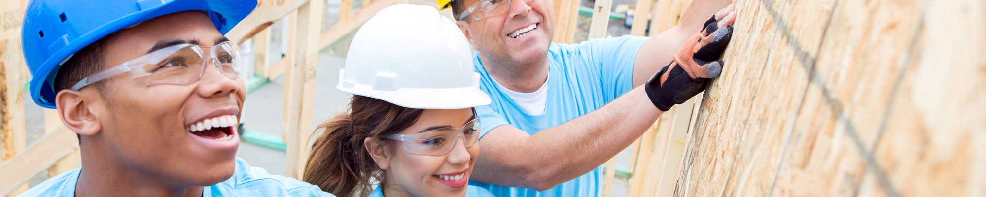 Volunteers helping to build a home