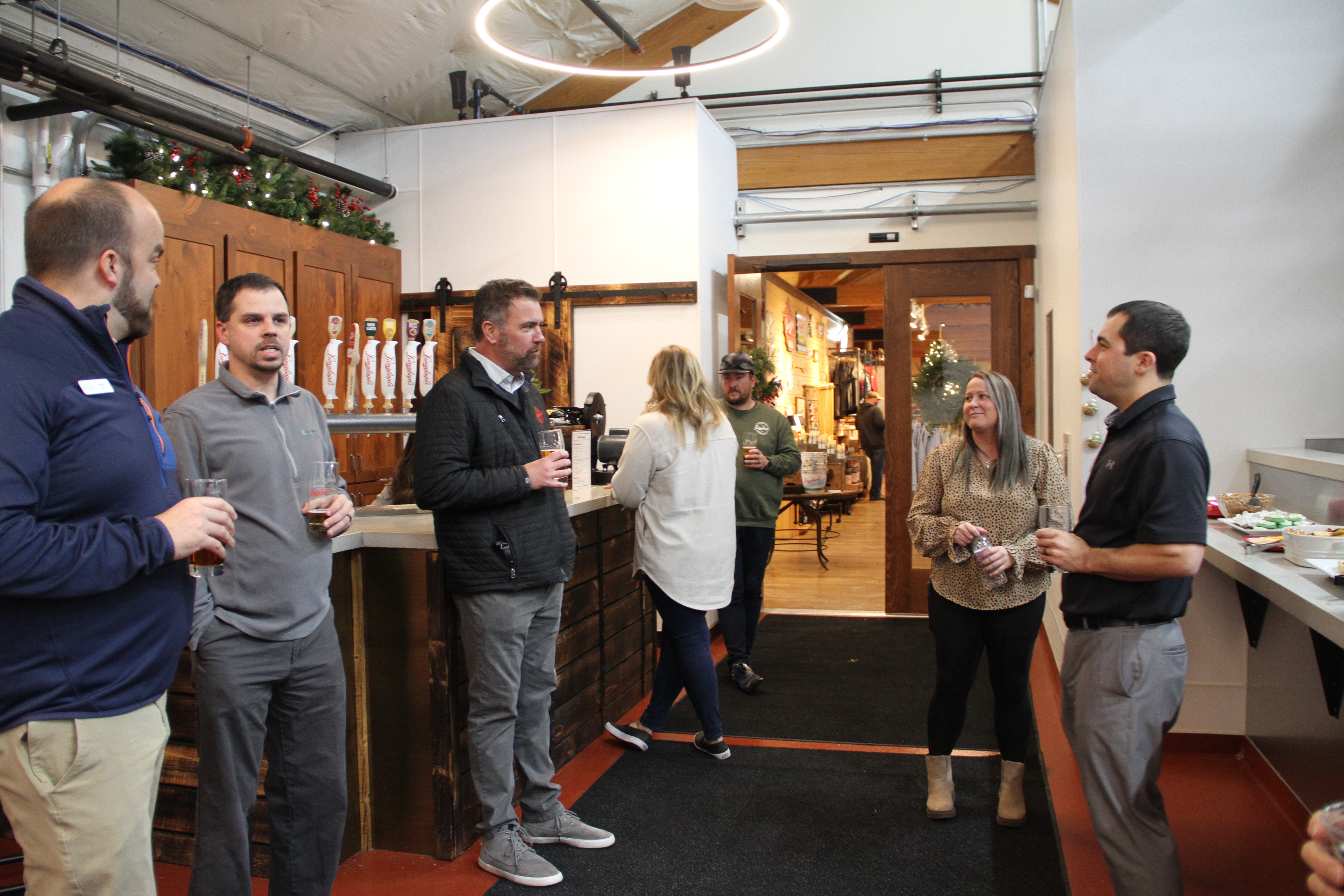 Emerging Leaders at Happy Hour at Leinie Lodge in December of 2022